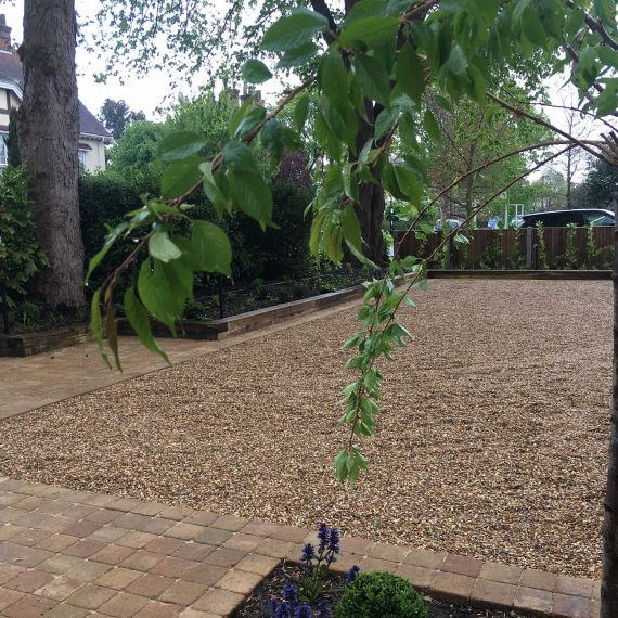 gravel drive with block paving edges and paths