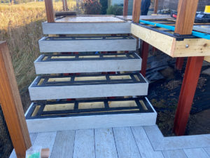 composite decking steps under construction and awaiting treads