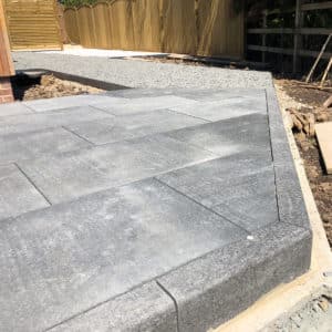 detail of limestone patio with kerb stones